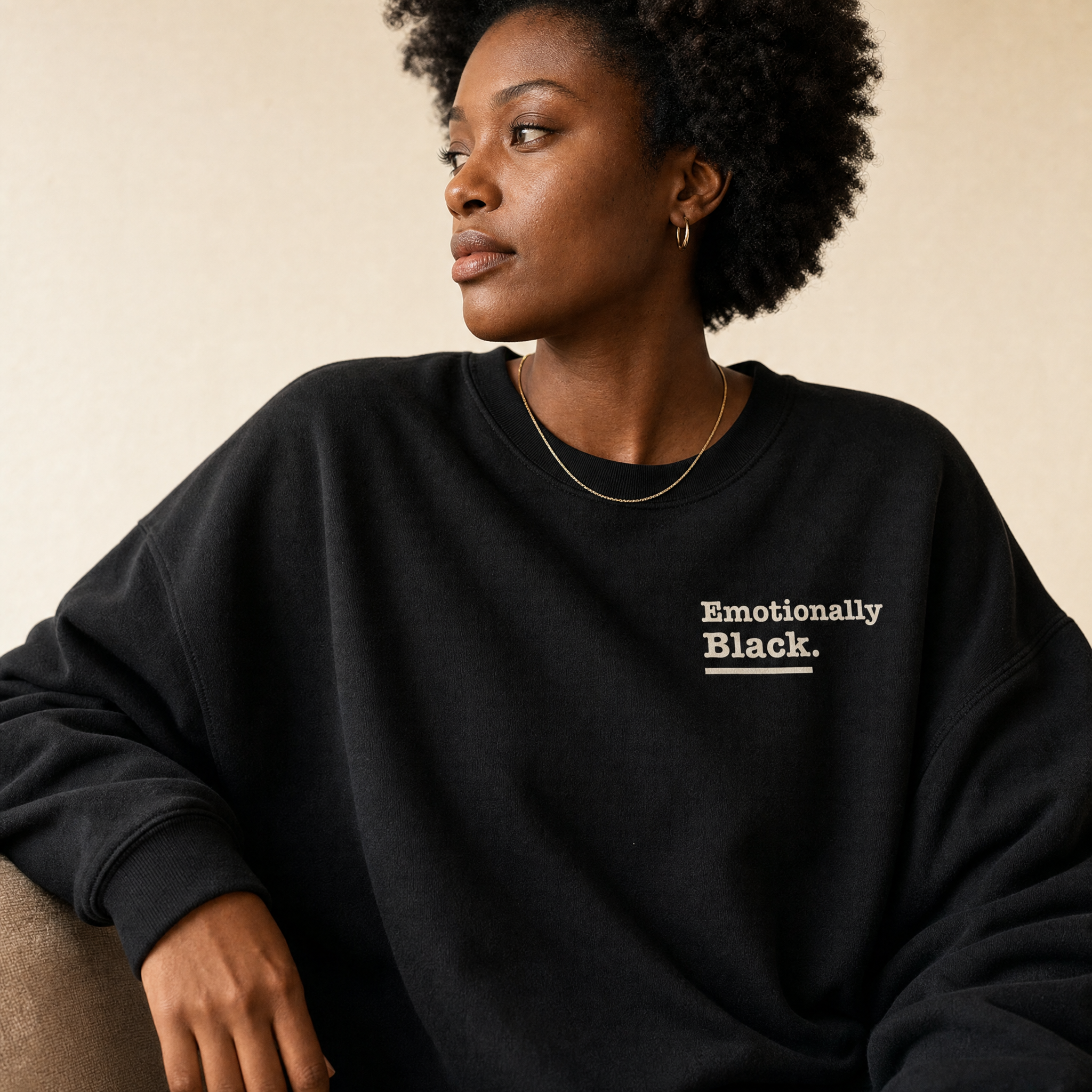Detail view of the Blackety Black Peace Is Letting People Be Wrong About You crewneck — cream-ink statement back print